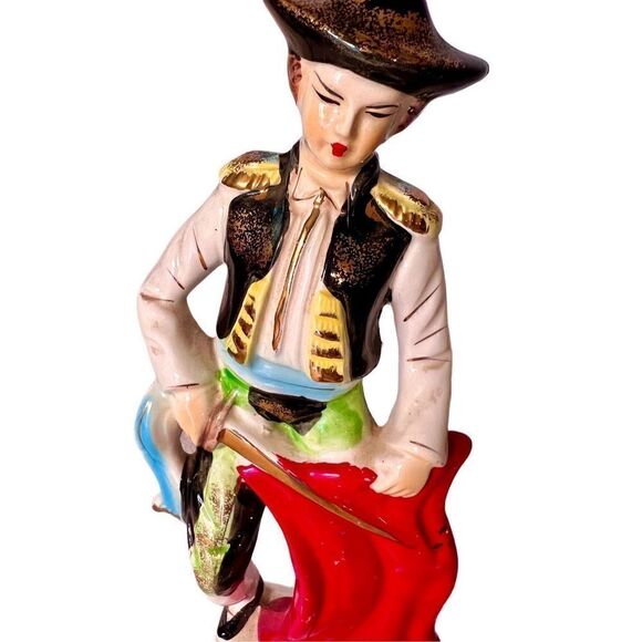 Vibrant Mid Century Bullfighter Figurine
Matador Statue With Sword & Red
Cape - Picture 2 of 12